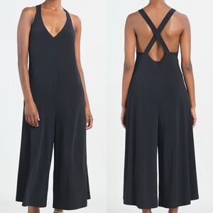 URBAN OUTFITTERS V-Neck Cross Back Cropped Wide Leg Jumpsuit Neutral Bla…